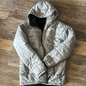Boys north face winter jacket. Color is gray.